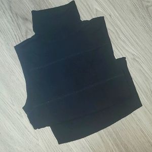 Long knit turtleneck tank blouse.